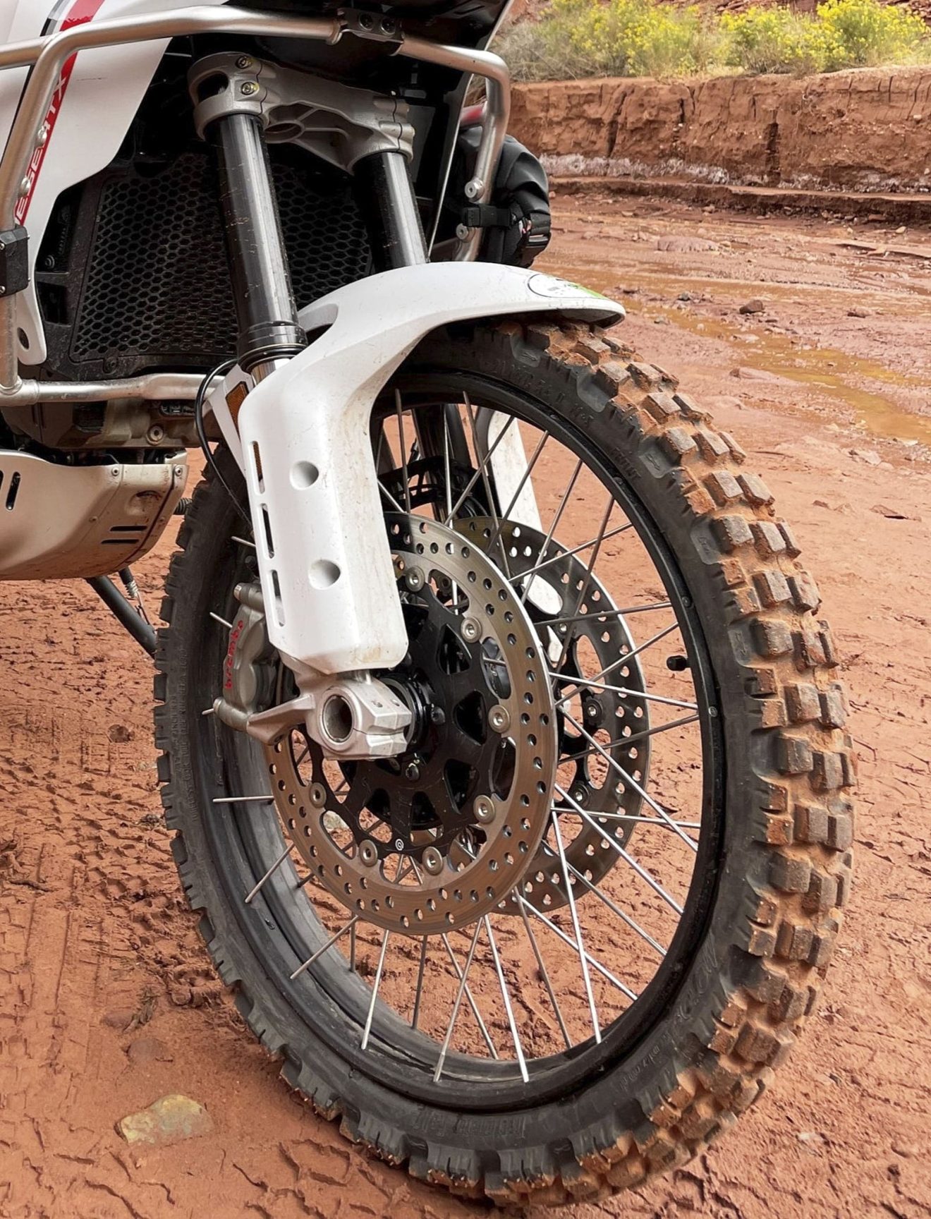 Even with more aggressive tires, the adjustable rotary steering damper, mounted on the Vanasche handlebar mount, will stabilize the bike on pavement at high speeds.